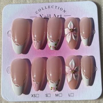 Pink nails with a white lace edge, painted roses and a sculpted flower